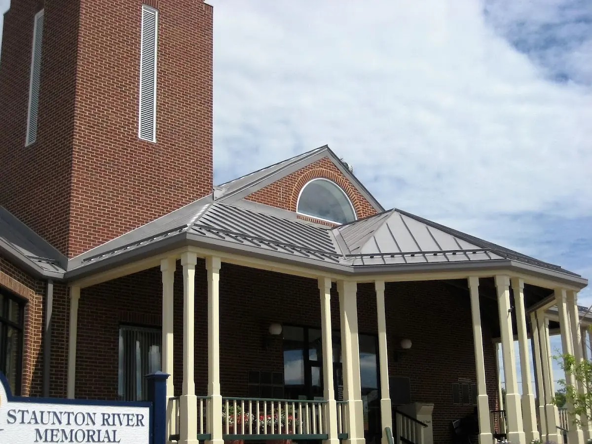 Skilled roofing craftsmen working on a residential roof in Columbia